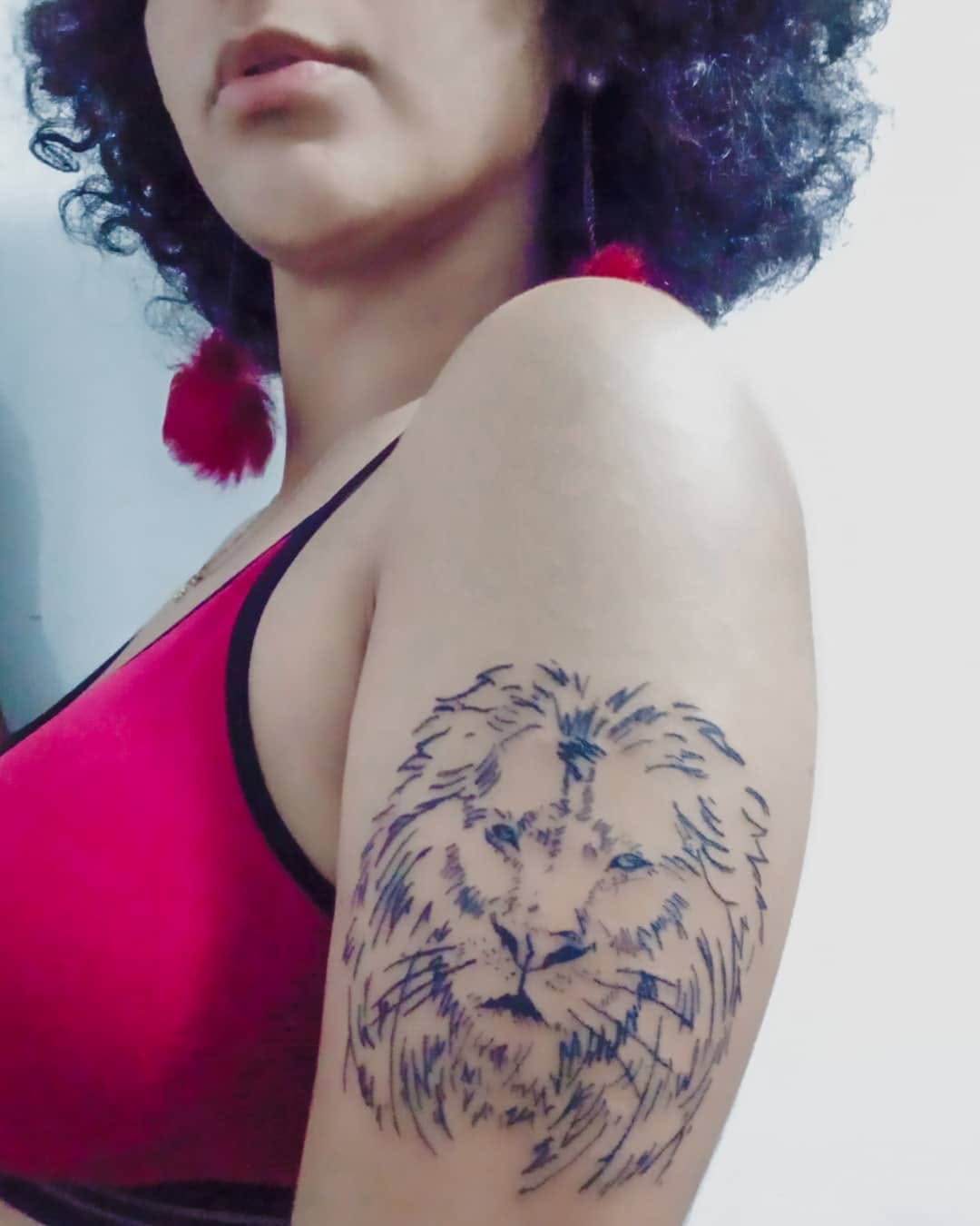 tatuagem de leão no braço